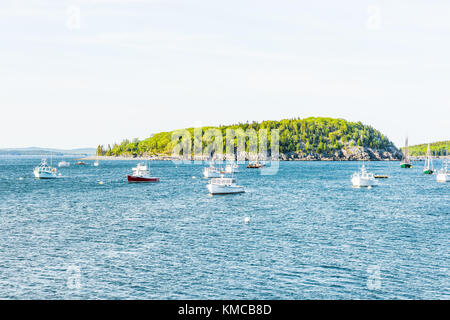 Bar Harbor, USA - June 8, 2017: Sunset in Bar Harbor, Maine village with empty sailing boats, vessels, ships on water Stock Photo