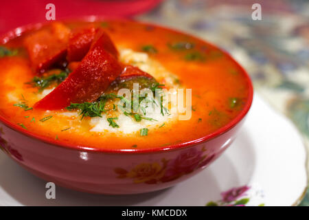 Mexican food - huevos rancheros. Eggs poached in tomato sauce salsa and other vegetables. Top view Stock Photo