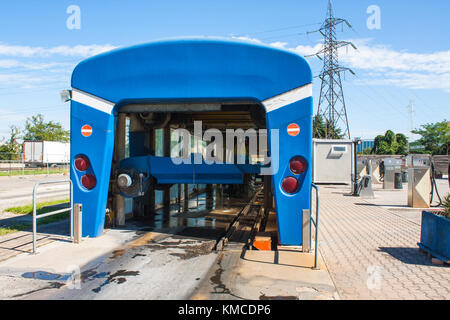 Automated portal carwash with a car running through Stock Photo