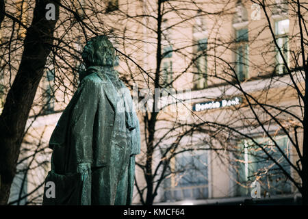 Helsinki, Finland. Evening View Of Monument To Finnish Poet And Journalist Eino Leino In Esplanade Park. Stock Photo