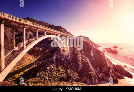 Vintage toned picture of the Bixby Creek Bridge at sunset, Pacific Coast Highway, California, USA. Stock Photo