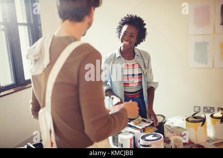 Couple painting living room Stock Photo