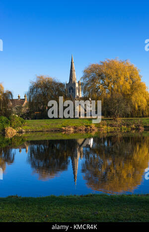 St. Mary the Virgin Church reflected in the lower pool off Great Ouse river, Godmanchester, Cambridgeshire, England, UK. Stock Photo