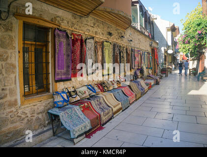Carpet shop at a alley, Kaleici, the old town of Antalya, turkish riviera, Turkey Stock Photo