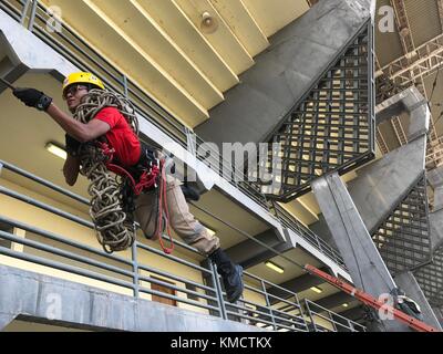 Macapa, Brazil. 17th Nov, 2017. A firefighter practices a manoeuvre at the Zerao soccer stadium in Macapa, Brazil, 17 November 2017. Measurements show that the equator draws through this arena without touching the centre line. Credit: Georg Ismar/dpa/Alamy Live News Stock Photo
