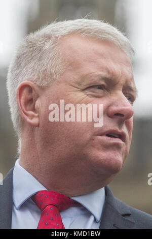 London UK. 6th December 2017. Labour MP Ian Lavery attends a  photocall with Unite members and other Labour MPs outside Parliament to campaign  for justice for workers who were historically blacklisted by construction companies and to demand for a public inquiry into blacklisting.  The blacklist resulted in hundreds of workers losing their jobs and being unable to secure new ones after being deemed troublemakers while raising legitimate workplace issues. Credit: amer ghazzal/Alamy Live News Stock Photo