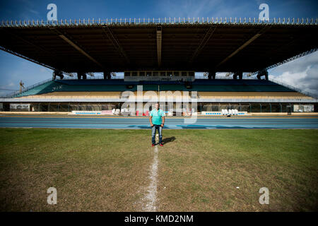 Macapa, Brazil. 17th Nov, 2017. Director of the Zerao soccer stadium, Irismar 'Mazinho' Veras, stands on the centre line of his stadium in Macapa, Brazil, 17 November 2017. Measurements show that the equator draws through this arena without touching the centre line. Credit: Autumn Sonnichsen/dpa/Alamy Live News Stock Photo