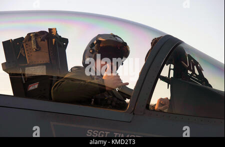 South Korea . 05th Dec, 2017. A U.S. Air Force F-15C Strike Eagle fighter pilot gives the all clear signal as he taxis for take off during exercise Vigilant Ace at Gwangju Air Base December 5, 2017 in Kwang Ju, South Korea. Hundreds of aircraft from the United States and South Korea are taking part in the massive air exercise. Credit: Planetpix/Alamy Live News Stock Photo