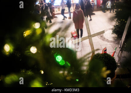 Berlin, Germany. 06th Dec, 2017. A cross stands in front of the Memorial Church at the Breitscheidplatz square in Berlin, Germany, 06 December 2017. Credit: Sophia Kembowski/dpa/Alamy Live News Stock Photo