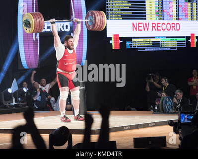 Anaheim, California, USA. 5th Dec, 2017. LASHA TALAKHADZE, of Georgia, competes in the Clean and Jerk which will factor into a world record for combined Snatch and Clean and Jerk Lifts on Tuesday evening. Talakhadze, of Georgia, took not only the Snatch Lift along with the Clean and Jerk Lift as well as the overall championship but also managed, in addition, to break two world records a the same time. Credit: David Bro/ZUMA Wire/Alamy Live News Stock Photo