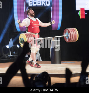 Anaheim, California, USA. 5th Dec, 2017. LASHA TALAKHADZE, of Georgia, reacts to his recording breaking lift giving him the combined overall record of 477 kilos on Snatch and Clean and Jerk Lifts on Tuesday evening. Lalakhadze, of Georgia, took not only the Snatch Lift along with the Clean and Jerk Lift as well as the overall championship but also managed, in addition, to break two world records a the same time. Credit: David Bro/ZUMA Wire/Alamy Live News Stock Photo