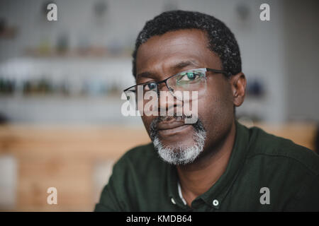 mature african american man in bar Stock Photo