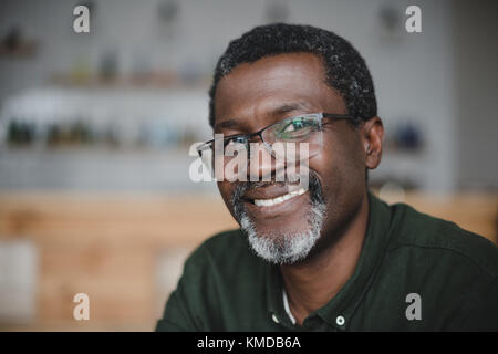 mature african american man in bar Stock Photo