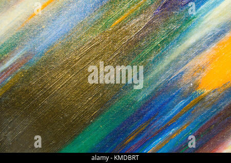 Big bronze smear against the background of dark blue and green, small yellow spots Stock Photo