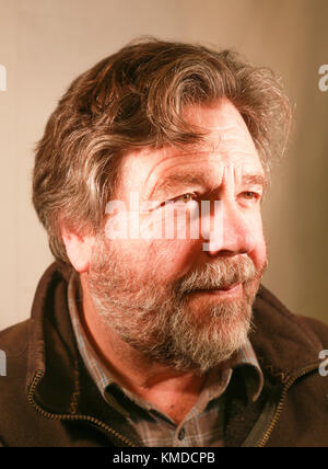 bearded man looking sideways serious face Stock Photo