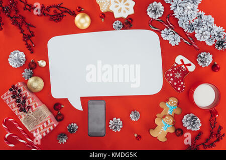 christmas decorations and speech bubble Stock Photo