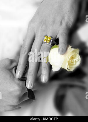 Bride showing off  large wedding ring in black and white. Stock Photo