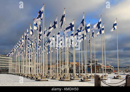 HELSINKI, FINLAND - DECEMBER 6, 2017: 100 flags of Finland on the Helsinki Market Square to celebrate 100-years-old Finland. Stock Photo