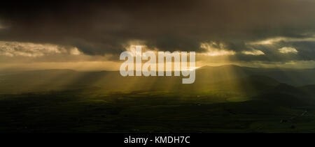Crepuscular rays over the Llyn peninsular, Wales Stock Photo