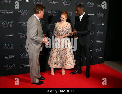 Director Aaron Sorkin, Idris Elba and Jessica Chastain attending the UK Premiere of Molly's Game, at Vue West End, Leicester Square, London. Stock Photo