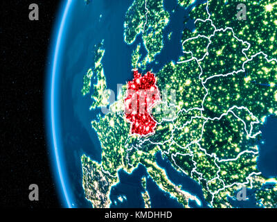 Space orbit view of Germany highlighted in red on planet Earth at night with visible country borders and city lights. 3D illustration. Elements of thi Stock Photo