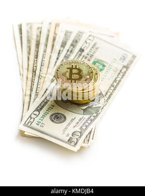 Golden bitcoins. Cryptocurrency and dollars isolated on white background. Stock Photo
