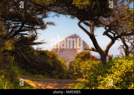 View of Haystack Rock from the top of Cape Kiwanda sandstone hills at Pacific City, Oregon Stock Photo