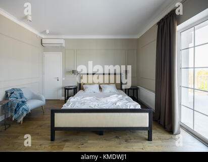 Modern bedroom with big window Stock Photo