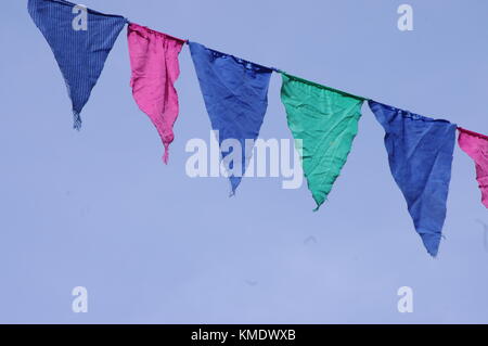 colorful pennants blue sky Stock Photo