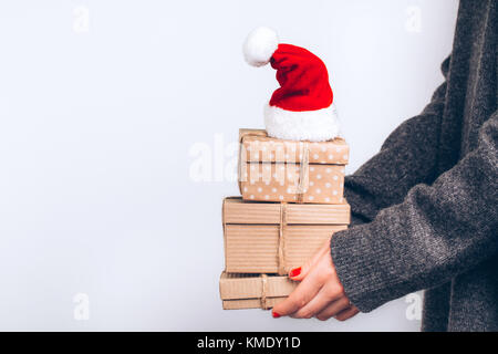 Hands with craft gift boxes Stock Photo