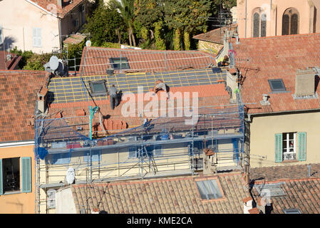 Roofers Retiling Roof or Roof Replacement in Le Suquet Old Town, Cannes, Alpes-Maritimes, France Stock Photo