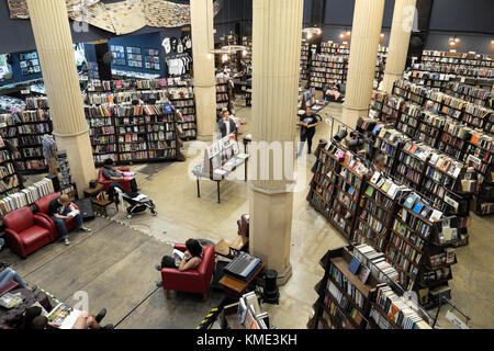 The Last Bookstore interior view of people reading & books on shelves in bookshop book shop in downtown Los Angeles LA California US USA   KATHY DEWITT Stock Photo