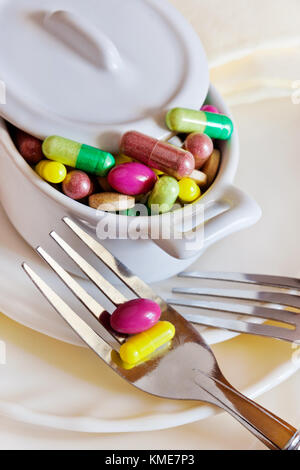 healthcare and wellness - diet and detox, diet pills and tablets, measuring tape Stock Photo