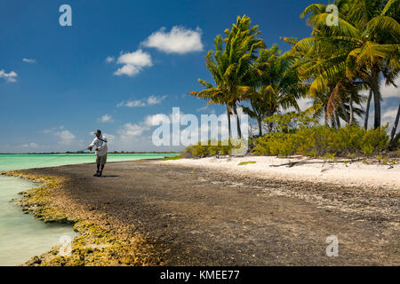 Head Guide Eketie Catches Lunch, Kiribati Atoll Stock Photo