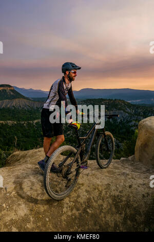 Male mountain biker in scenic landscape enjoying view,Durango,USA Stock Photo