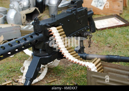 World war 2 era historical M1919 Browning machine gun mounted on a tripod. Stock Photo