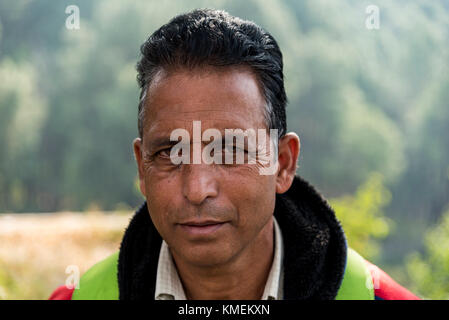 Portrait of a poor Indian man giving a serious expression. Stock Photo