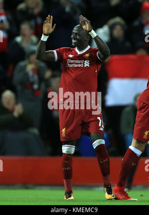Liverpool's Sadio Mane celebrates scoring his sides fourth goal during the UEFA Champions League, Group E match at Anfield, Liverpool. Stock Photo