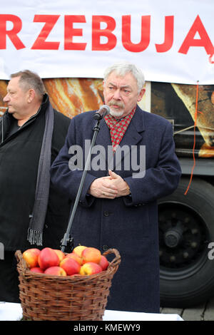 CRACOW, POLAND - DECEMBER 20, 2015:  Cardinal Stanislaw Dziwisz during Christmas Eve for poor and homeless on the Central Market in Cracow. Stock Photo