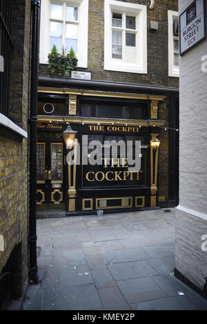 The Cockpit public house, 7 St Andrew's Hill, London EC4V 5BY. The pub was built in the 1840s and became famed for its cockfights. Look up and you’ll  Stock Photo