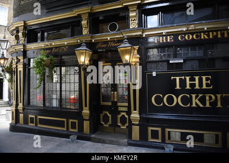 The Cockpit public house, 7 St Andrew's Hill, London EC4V 5BY. The pub was built in the 1840s and became famed for its cockfights. Look up and you’ll  Stock Photo