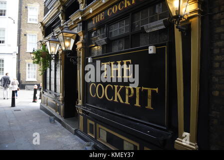 The Cockpit public house, 7 St Andrew's Hill, London EC4V 5BY. The pub was built in the 1840s and became famed for its cockfights. Look up and you’ll  Stock Photo