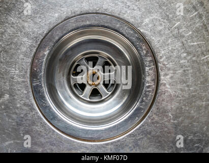 Close up of a stainless Steel sink plug hole Stock Photo