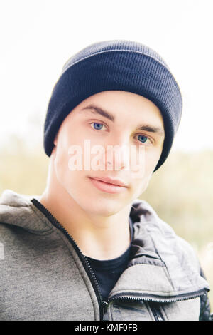 handsome young man posing for the camera Stock Photo
