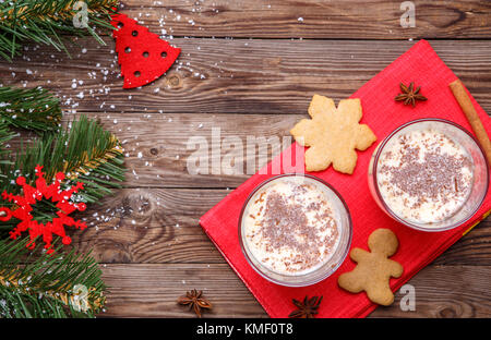 Egg-flip, cookies on red napkin Stock Photo