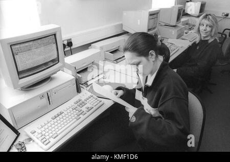 Female inmates in prison computer room learning IT skills, HMP Winchester, Winchester, Hampshire, United Kingdom. 10 May 2001. Stock Photo