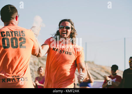 Two male members of sports team celebrating victory at competition,Tenerife,Canary Islands,Spain Stock Photo