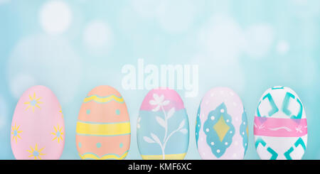 Painted Easter eggs on a colorful background Stock Photo