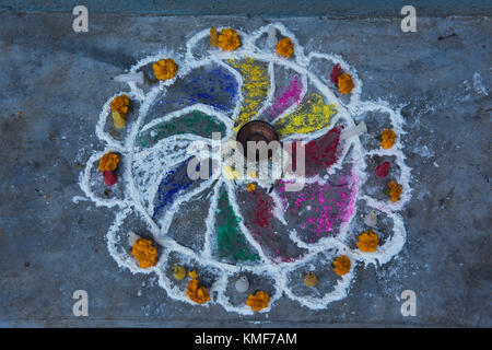 Rangoli patterns of coloured rice, flowers, and flour to bring good luck and welcome the festival of Tihar, Kathmandu, Nepal Stock Photo