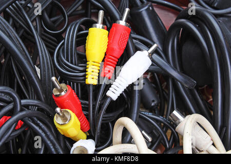 Red yellow white cables. Audio video cable cord texture pattern as background. Stock Photo